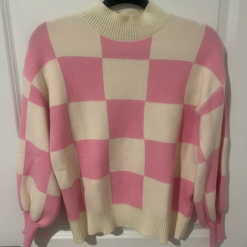 Cozy Pink and Cream Checkered Turtleneck Sweater